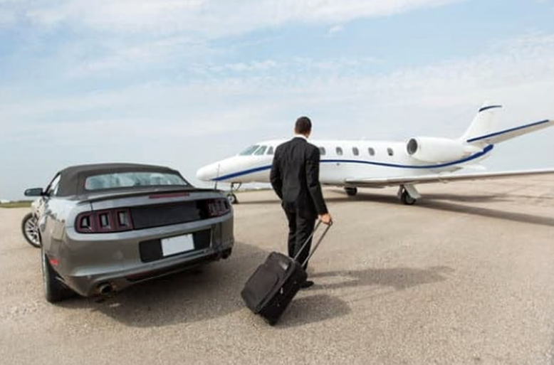 man with a luxury car and plane